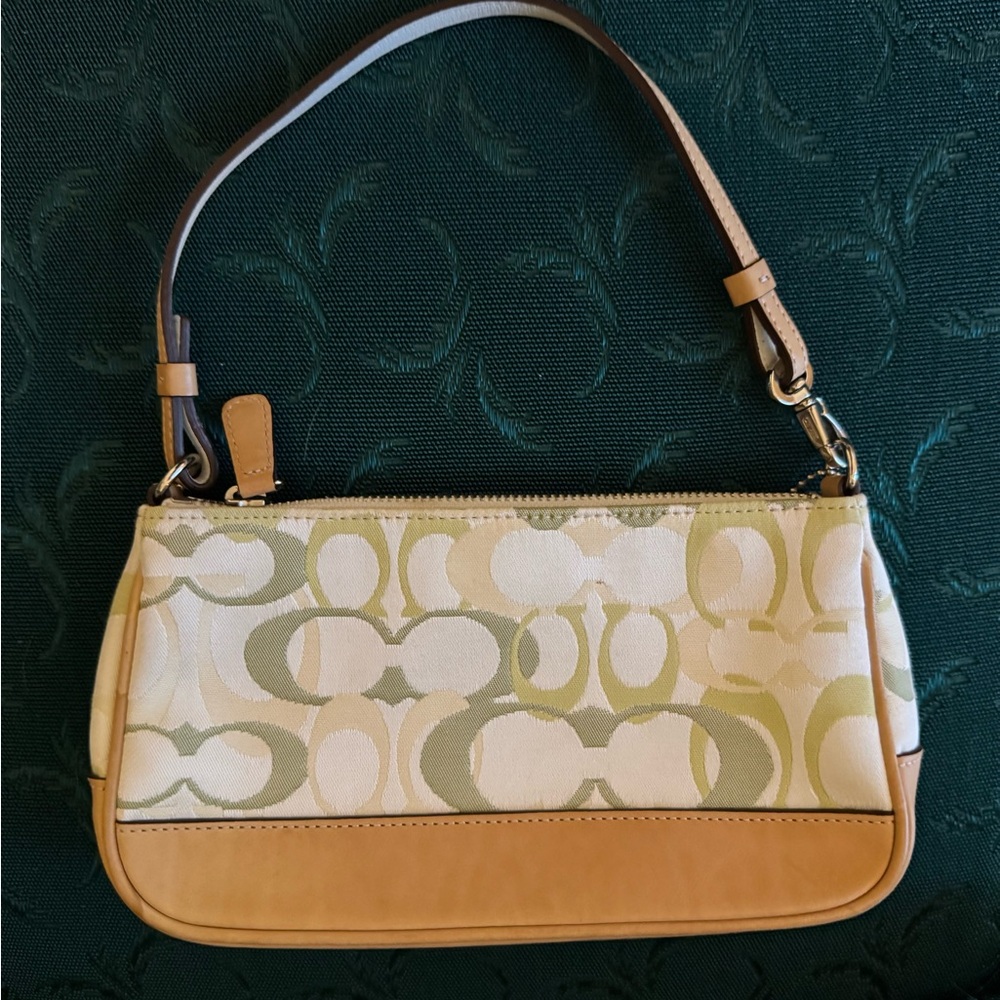 Coach Tan and Cream Clutch with Signature Pattern